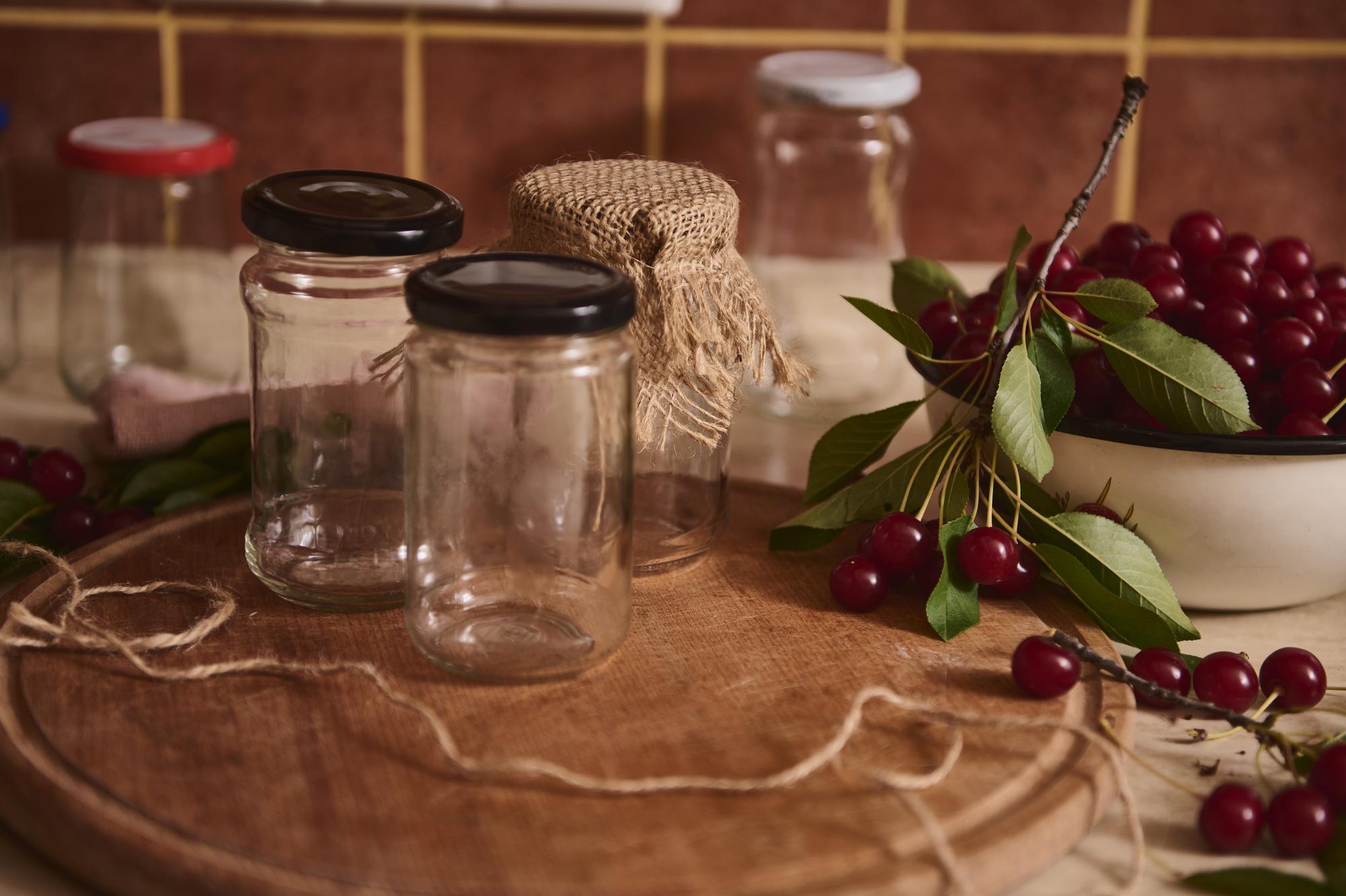 Warm studio counter with jars and recipe notes